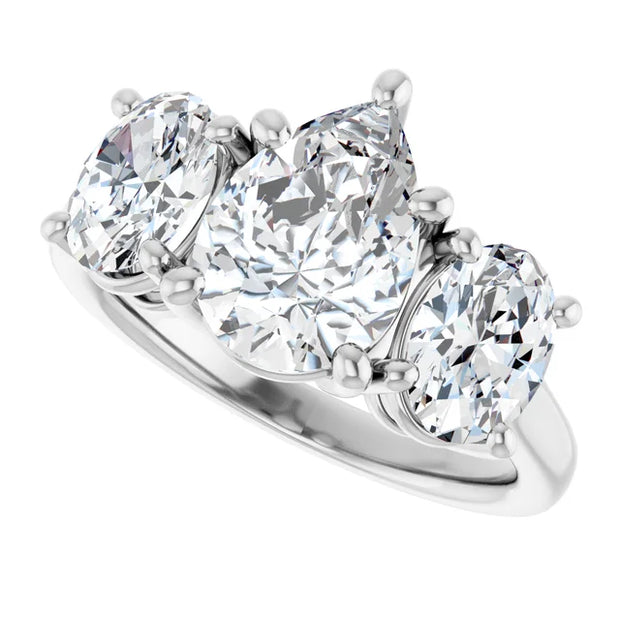 14k White Gold 3/4 CTW Pear and Oval Diamond Three-Stone Ring
