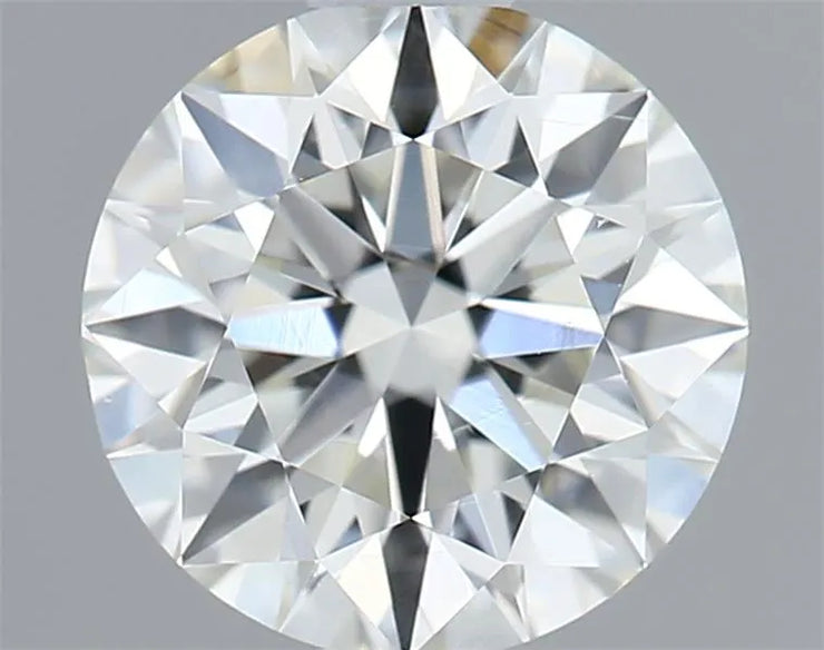 Close-up of a round diamond with a gray background